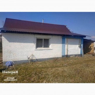 Продам дом в Чепилиевке.25 соток.Газ, свет, вода